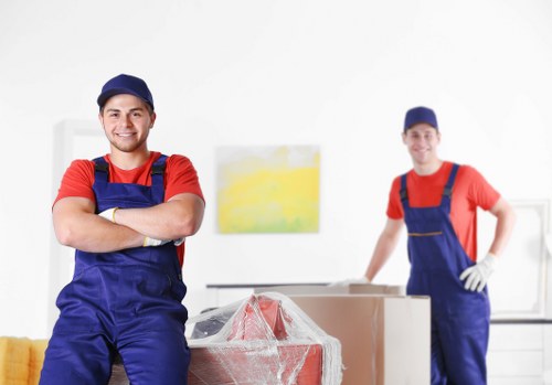 Careful packing of household items for a flat move in South Kensington