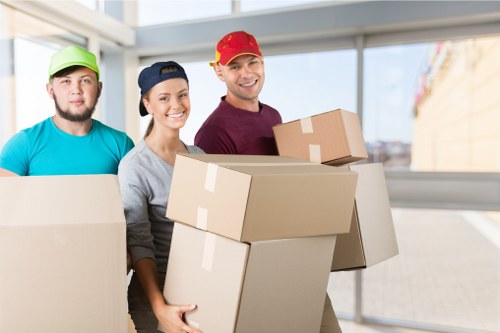Removal team preparing a safe home move with protective equipment