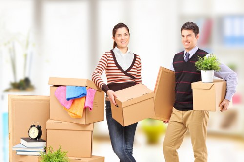 Safe and professional removal crew with moving equipment