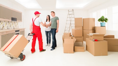 Organized student move-out with labeled boxes and packing supplies